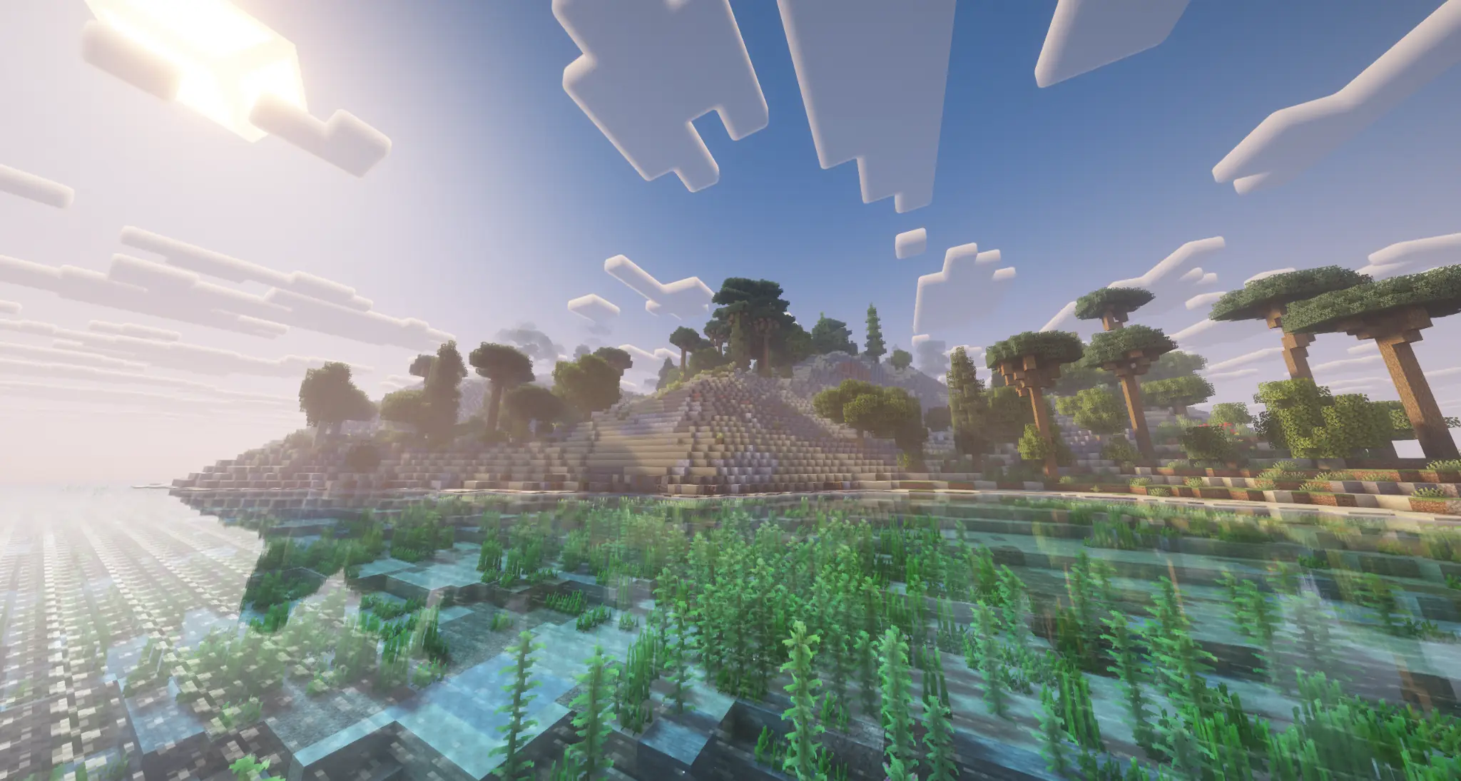 Wide green coastline in the Towny Reborn Earth world