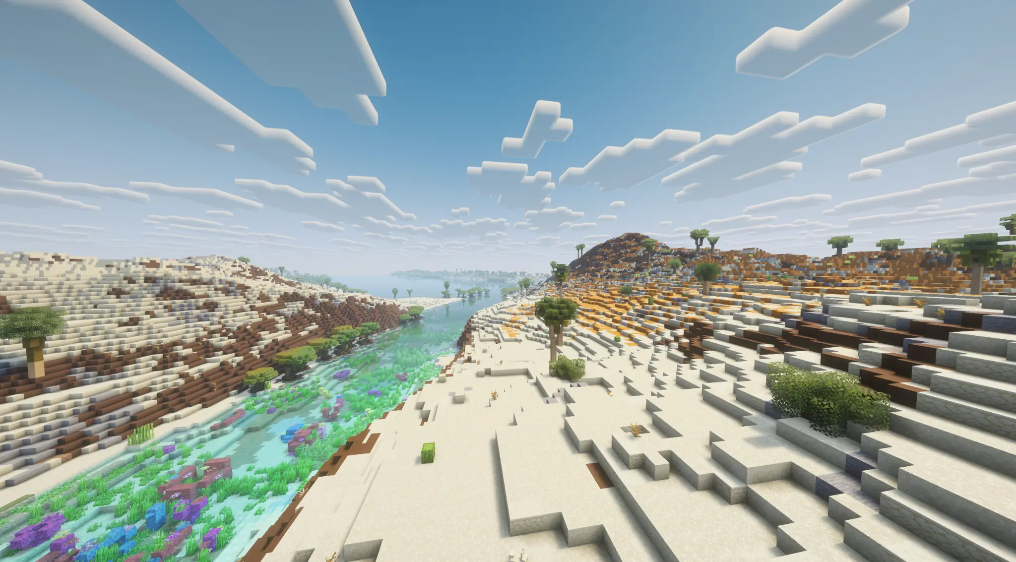 Clear river cutting through a dry desert landscape